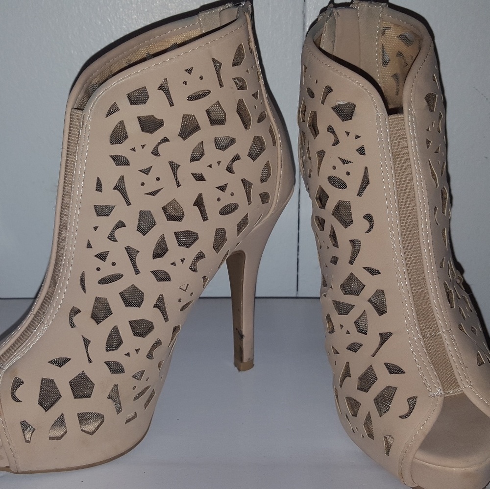 Nude laser cut cage heels